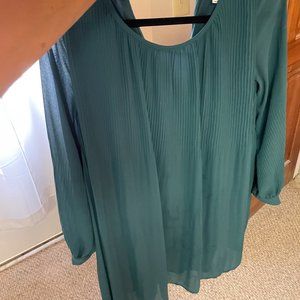 Small dark green long-sleeve flowy dress